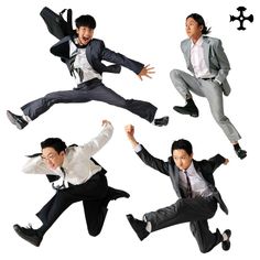 four men in suits and ties jumping into the air