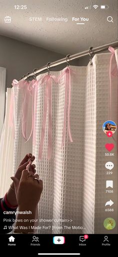 someone is taking a photo in front of the shower curtain with their feet on the shower