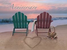 two beach chairs sitting on top of a sandy beach next to the ocean with a heart drawn in the sand