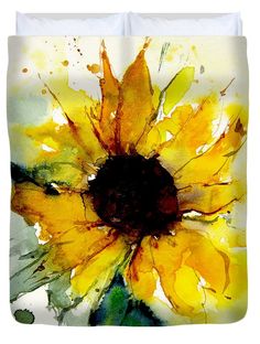 a yellow sunflower with green leaves on it's petals duveter cover