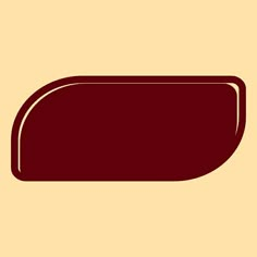 a brown rectangular object on a tan background with an orange border around the edges and bottom