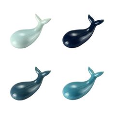 four different types of plastic whale toys