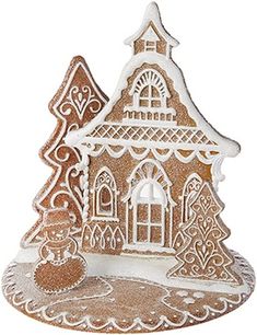 a cookie shaped like a house with a christmas tree