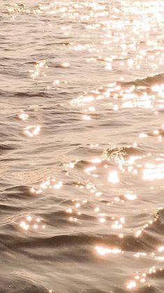 the sun shines brightly on the water as it reflects off the surface of the water