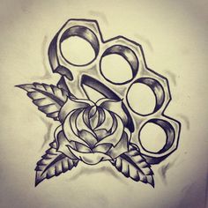 a drawing of some scissors and a rose on a piece of paper with leaves around it