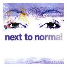 a poster with the words next to normal on it