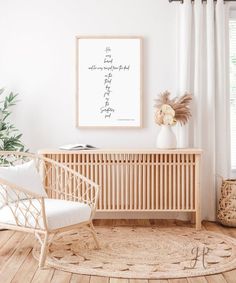 a living room with white walls and wooden furniture, including a plant on the wall