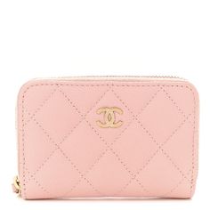 This is an authentic CHANEL Caviar Quilted Zip Coin Purse in Light Pink. This petite wallet is crafted of pink caviar leather. This purse features a wrap-around zipper and a gold CC logo on the front. The zipper opens to a matching fabric interior. Chanel Coin Purse, Round Coin Purse, Chanel Caviar, Chanel Wallet, Coin Pouch, Cc Logo, Purse Pouch, Pink Fabric, Light Pink