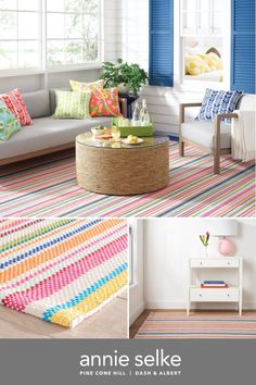 a colorful living room with blue shutters and white couches, striped rug on the floor