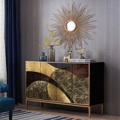 a gold and black cabinet in a room