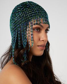 Glittering with beads that drape along the back of the neck, this fringed headpiece will give your outfit a heavenly glow.Unleash your inner showgirl in this beautiful headpiece: jazz-age flapper-worthy opulence with a thoroughly modern edge. Cher Headpiece, Beaded Head Piece, Adjustable Flapper Headpieces For Party, Flapper Style Headpieces For Party And Carnival, Flapper Style Party Costume Hats And Headpieces, Glamorous Adjustable Party Headpieces, Beaded Fitted Headpieces For Party, Glamorous Party Headpieces With Rhinestones, Fitted Flapper Headpiece For Party