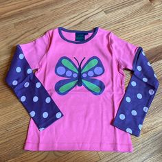 This New Without Tag Long Sleeve Tee Is By Mini Boden. It Is A Size 7-8 And Is Pink. It Features A Beautiful Butterfly In Front With Purple Sleeves And Piping Around The Neckline. Such A Fun And Great Shirt. Think Back To School! Long Sleeve Cotton Tops With Butterfly Print, Playful Fitted Purple Tops, Purple Long Sleeve Tops For Playtime, Butterfly Shirt, People Clothes, Butterfly Shirts, Rainbow Shirt, Purple Butterfly, Mini Boden