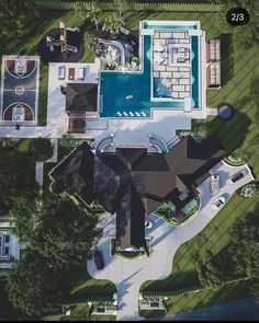 an aerial view of a house with a swimming pool