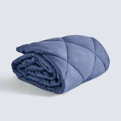 a blue blanket folded on top of each other