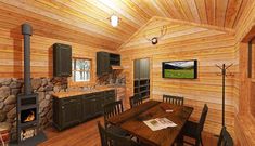 the interior of a log cabin with wood flooring and stone walls, including a fireplace