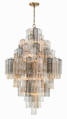 a large chandelier with many glass pieces hanging from it's ceiling fixture