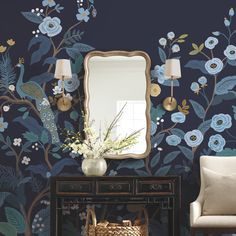 Create a statement wall with our Peacock Mural, featuring magnificent birds perched on winding branches surrounded by blooming flowers and lush leaves. Based on our best-selling wallpaper pattern, this mural is designed to be full at the bottom and delicately taper off as it grows up the wall. York Wallcoverings always recommends visiting your local York Authorized Dealer, Showroom or Designer. These local partners have a vast product knowledge and can provide invaluable assistance with color an Peacock Mural, Peacock Wallpaper, Iconic Wallpaper, Navy Wallpaper, Removable Wall Murals, Statement Wall, Wallpaper Rolls, Wallpaper Direct, Wallpaper Calculator