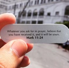 someone is holding up a piece of paper that says whatever you ask for in prayer, believe that you have received it, and it will be yours