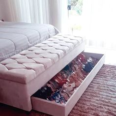 a bed that has some shoes in it