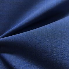 a close up shot of blue fabric