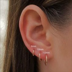 Our non tarnish gold Vermeil sleeper hoops are the perfect everyday addition to your ears! ♥️ Real Gold-Plated Sterling Silver (Vermeil) Hoops ♥️ Hypoallergenic ♥️ The perfect, everyday hoops ♥️ Choose your size ♥️ 1.2mm thickness ♥️ Small and Easy to put in ♥️ Free gift bag included, ready for gifting straightaway  This listing is for 1 hoop earring, if you need a pair please buy 2  For any more questions - please message me x Free Shipping! (UK ONLY) 1st class to UK. Tracked & Signed to International Locations. Please select TRACKED delivery to UK for Guaranteed delivery.  By using the free 1st class large letter postage you are agreeing that I am not responsible for lost items in the post. Please be aware that, unfortunately, I cannot offer refunds for post that is lost in the mail unle Dainty Stackable Small Hoop Earrings, Dainty Small Hoop Stackable Earrings, Minimalist Stackable Huggie Cartilage Earrings, Simple Hypoallergenic Small Hoop Huggie Earrings, Dainty Stackable Small Hoop Cartilage Earrings, Dainty Small Hoop Stackable Cartilage Earrings, Dainty Hypoallergenic Hoop Cartilage Earrings, Simple Hypoallergenic Huggie Cartilage Earrings, Simple Small Hoop Hypoallergenic Cartilage Earrings