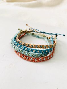 multicolored bracelets on white background