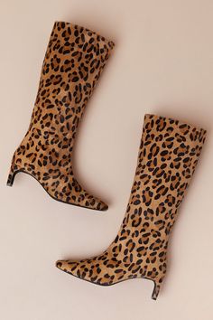 The Intentionally Blank Seville Cheetah Calf Hair Leather Knee-High Boots are about to be the fashion statement of the season! Sleek genuine calf hair (with a tan and black cheetah print throughout) shapes a pointed-toe upper that rises to a 14"" knee-high with a 15"" circumference. A 7.5"" zipper at the instep allows for easy on-and-off, while a chic blade heel completes the look! Available in Euro sizes only. 2. 5" wrapped blade heel. Lightly cushioned insole. Rubber sole has nonskid markings. Black Cheetah Print, Intentionally Blank, Knee High Leather Boots, Calf Hair, Seville, Cheetah Print, Knee High Boots, High Boots, The Fashion