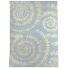 a blue and yellow tie dyed fabric with circular design on the top, it is very soft