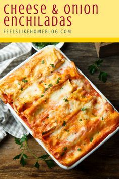 cheese and onion enchiladas in a casserole dish with parsley on the side