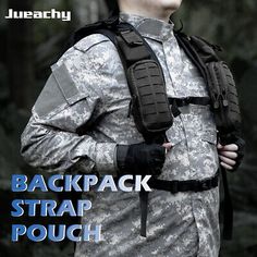 the back pack strap pouch is attached to a soldier's uniform, while holding his hands in his pockets