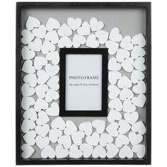 a black frame with white hearts in it