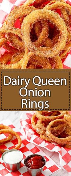 onion rings on a red and white checkered table cloth with dipping sauce in the middle