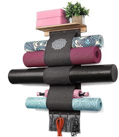 yoga mats are stacked on top of each other