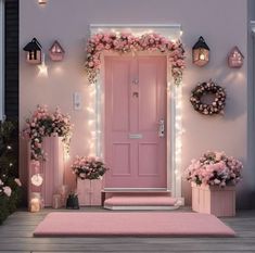 a pink front door decorated with flowers and wreaths