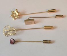 Lot of vintage gold tone hat stick pins good condition measures 2 1/2" long Hat Pins Vintage, Gold Clips, Stick Pins, Hat Pins, Vintage Gold, Accessories Hats, Gold Tones, Ships, Hats