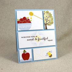 a greeting card with pictures of fruits and honeybees, beehive, apple