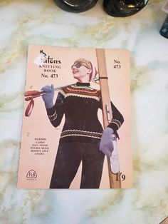 an old fashion sewing pattern for a woman's sweater and pants