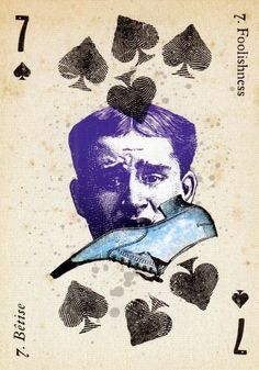 an old playing card with a man's face in the middle and hearts on it