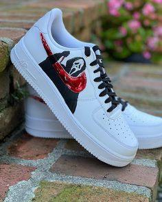 Scream inspired Air Force 1s 👻 This design was a experimental pair done for Halloween. The ghostface is painted and protected like all my other customs but the swoosh may be slightly sticky and my become runny if wet, I offer a alternative design (design 2) if you like a more durable shoe All shoes are painted using angelus paint and a finisher is applied afterwards to protect the paint job If you wear a women's shoe just covert the size or message me your size before ordering Disclaimers: Retu Custom Air Force 1 Halloween, Halloween Air Force 1, Scream Air Force 1, Ghost Face Shoes, Shoe Customization Ideas, Painted Forces, Custom Jordan Shoes