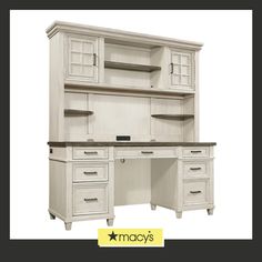 a white desk with drawers and shelves on it