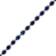 Give your classic style a vibrant update with this oval-shaped blue lab-created sapphire with rope-textured frame silver tennis bracelet. Crafted in sterling silver This look glistens with a row of sideways 6.0 x 4.0mm oval-shaped bright blue lab-created sapphires. A rope-textured frame surrounds each center stone to complete this sophisticated design. This 7.5-inch bracelet secures with a tongue and groove clasp. Classic Oval Gemstone Tennis Bracelet, Blue Oval Tennis Bracelet For Formal Occasions, Blue Oval Sapphire Tennis Bracelet, Blue Sapphire Oval Tennis Bracelet, Classic Oval Sapphire Tennis Bracelet, Classic Sapphire Oval Tennis Bracelet, Sapphire Gemstone Tennis Bracelet With Oval Shape, Oval Sapphire Gemstone Tennis Bracelet, Formal Sapphire Oval Bracelets