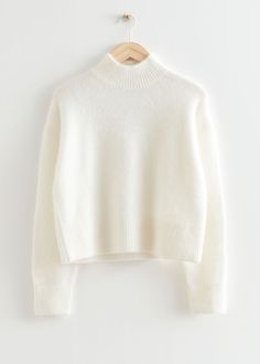 Cropped mock neck knit sweater featuring a cropped, boxy silhouette.– Ribbed collar, cuffs and hemline– Certified according to the Responsible Mohair Standard (CU810300)– Certified according to the Responsible Wool Standard (CU810300)Length of sweater: 51cm / 20.1" (Size S) Camel Winter Coat, Wineries Outfit, Trouser Outfits, Ribbed Turtleneck Sweater, Camel Coat, Sweater White, White Sweater, Cool Sweaters, Fashion Story