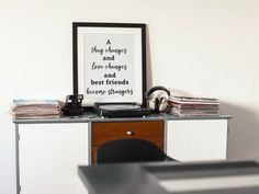 a record player sitting on top of a desk