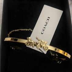 Brand New With Tags, Coach Bracelet. Absolutely Gorgeous. Use My Code Sfilefile To Get $10 Off Your First Purchase Upon Signing Up For Posh. Luxury Coach Bracelet Jewelry, Coach Gold Bangle Bracelet, Classic Coach Bangle Jewelry, Coach Classic Bangle Jewelry, Coach Formal Bracelet Jewelry, Coach Luxury Bracelet, Coach Classic Bangle, Coach Formal Bracelet, Luxury Adjustable Coach Jewelry