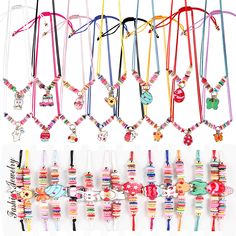 several different types of bracelets hanging on a wall with beads and charms attached to them