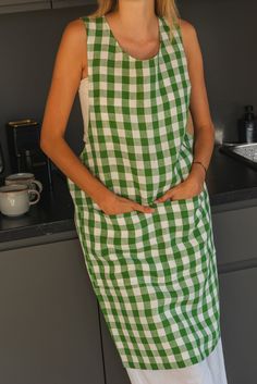 Experience effortless style and functionality with our linen pinafore apron. This full-length apron combines the charm of a traditional pinafore with modern simplicity, featuring a dress-like silhouette that feels light and airy. The cross-back design eliminates ties or hooks, allowing for easy movement. It’s perfect for keeping your clothes clean while you go about your day in style. • ABOUTThis listing includes one apronThis pinafore-style apron features convenient front pockets for added prac Linen Pinafore Apron, Apron Design, Linen Pinafore, Pinafore Apron, Rosy Brown, Knit Alpaca, Knit Bottom, European Linens, Linen Apron