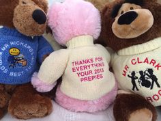 two teddy bears wearing sweaters with the words thanks for everything your 2013 proppies written on them