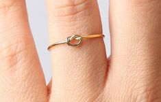 Made in USA, This Dainty 14K Gold Filled Love Knot Ring is Available in Size 5, Size 6, and Size 7. Each Ring is Sold Per Piece. Free Shipping. Love Knot Ring, 5 To 7, Knot Ring, Love Knot, Stackable Rings, Gold Filled, Made In Usa, Jewelry Rings, Size 7