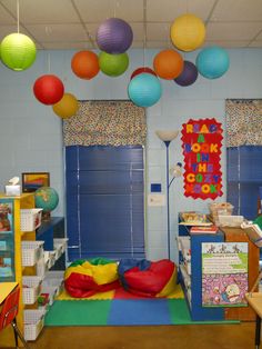 the room is decorated with colorful paper lanterns