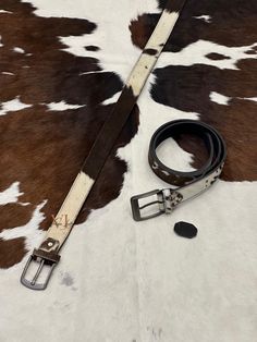 Elevate your style with our Luxurious Cowhide Premium Genuine Leather Belt, an exquisite piece designed to impress. Handcrafted from top-quality cowhide leather, this belt boasts a unique tricolor design with beautiful, natural hairs that make it a standout accessory. Key Features: Premium Cowhide Leather: Made from 100% genuine cowhide, this belt offers exceptional durability and a sumptuous feel. The high-quality leather ensures that it ages gracefully, developing a rich patina over time. Hand Designer White Leather Belts, Cowhide Belt, Genuine Leather Belt, Premium Gift, Weeding, Tri Color, High Quality Leather, Cowhide Leather, Leather Belt